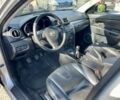 Серый Мазда 3, объемом двигателя 2 л и пробегом 248 тыс. км за 2000 $, фото 13 на Automoto.ua