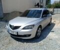 Серый Мазда 3, объемом двигателя 1.6 л и пробегом 312 тыс. км за 5900 $, фото 1 на Automoto.ua