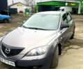 Серый Мазда 3, объемом двигателя 1.6 л и пробегом 290 тыс. км за 4999 $, фото 1 на Automoto.ua