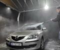 Серый Мазда 3, объемом двигателя 1.56 л и пробегом 320 тыс. км за 5800 $, фото 1 на Automoto.ua