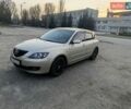 Серый Мазда 3, объемом двигателя 2 л и пробегом 260 тыс. км за 3700 $, фото 1 на Automoto.ua
