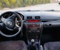 Сірий Мазда 3, об'ємом двигуна 2 л та пробігом 240 тис. км за 5399 $, фото 1 на Automoto.ua