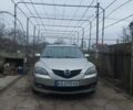 Серый Мазда 3, объемом двигателя 1.6 л и пробегом 247 тыс. км за 5500 $, фото 1 на Automoto.ua