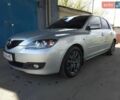 Сірий Мазда 3, об'ємом двигуна 1.6 л та пробігом 305 тис. км за 4400 $, фото 2 на Automoto.ua