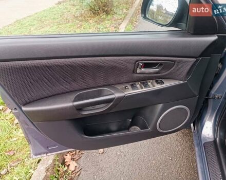 Серый Мазда 3, объемом двигателя 1.56 л и пробегом 269 тыс. км за 5200 $, фото 16 на Automoto.ua