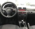 Серый Мазда 3, объемом двигателя 1.6 л и пробегом 220 тыс. км за 5090 $, фото 6 на Automoto.ua