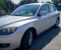Серый Мазда 3, объемом двигателя 1.6 л и пробегом 130 тыс. км за 4100 $, фото 1 на Automoto.ua