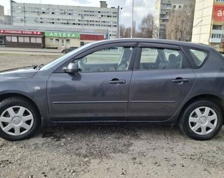 Серый Мазда 3, объемом двигателя 1.6 л и пробегом 212 тыс. км за 5999 $, фото 8 на Automoto.ua