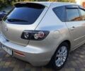 Серый Мазда 3, объемом двигателя 2 л и пробегом 169 тыс. км за 5700 $, фото 1 на Automoto.ua