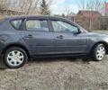 Серый Мазда 3, объемом двигателя 1.6 л и пробегом 212 тыс. км за 5999 $, фото 6 на Automoto.ua