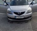 Серый Мазда 3, объемом двигателя 1.6 л и пробегом 226 тыс. км за 4100 $, фото 1 на Automoto.ua