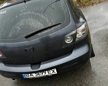 Серый Мазда 3, объемом двигателя 1.6 л и пробегом 190 тыс. км за 5000 $, фото 1 на Automoto.ua