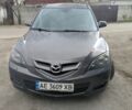 Серый Мазда 3, объемом двигателя 2 л и пробегом 258 тыс. км за 5000 $, фото 1 на Automoto.ua