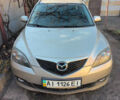 Серый Мазда 3, объемом двигателя 1.6 л и пробегом 185 тыс. км за 3000 $, фото 1 на Automoto.ua
