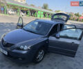 Сірий Мазда 3, об'ємом двигуна 1.6 л та пробігом 255 тис. км за 4900 $, фото 5 на Automoto.ua