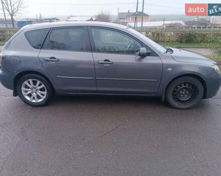 Серый Мазда 3, объемом двигателя 1.56 л и пробегом 269 тыс. км за 5200 $, фото 7 на Automoto.ua