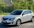 Серый Мазда 3, объемом двигателя 2 л и пробегом 248 тыс. км за 2000 $, фото 2 на Automoto.ua