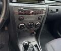 Сірий Мазда 3, об'ємом двигуна 2 л та пробігом 244 тис. км за 4800 $, фото 4 на Automoto.ua