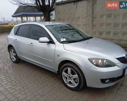 Серый Мазда 3, объемом двигателя 2 л и пробегом 260 тыс. км за 4300 $, фото 1 на Automoto.ua
