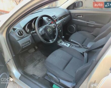 Серый Мазда 3, объемом двигателя 1.6 л и пробегом 185 тыс. км за 5999 $, фото 3 на Automoto.ua