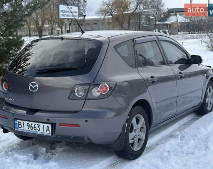 Серый Мазда 3, объемом двигателя 1.6 л и пробегом 200 тыс. км за 5999 $, фото 25 на Automoto.ua