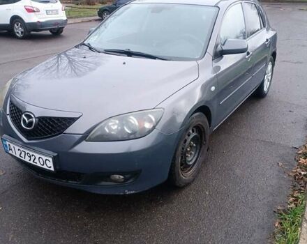 Серый Мазда 3, объемом двигателя 1.56 л и пробегом 269 тыс. км за 5200 $, фото 1 на Automoto.ua