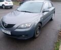 Серый Мазда 3, объемом двигателя 1.56 л и пробегом 269 тыс. км за 5200 $, фото 1 на Automoto.ua