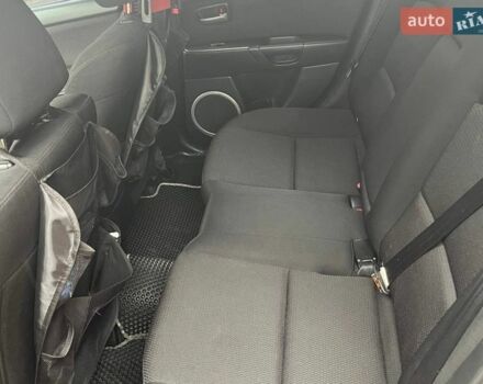 Серый Мазда 3, объемом двигателя 1.6 л и пробегом 153 тыс. км за 6000 $, фото 6 на Automoto.ua