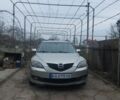 Серый Мазда 3, объемом двигателя 1.6 л и пробегом 240 тыс. км за 5400 $, фото 1 на Automoto.ua