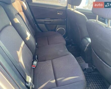 Серый Мазда 3, объемом двигателя 2 л и пробегом 301 тыс. км за 5400 $, фото 11 на Automoto.ua