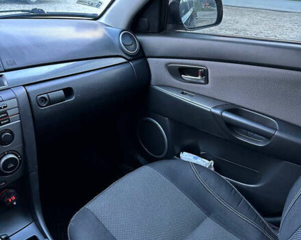 Серый Мазда 3, объемом двигателя 1.6 л и пробегом 248 тыс. км за 4600 $, фото 24 на Automoto.ua