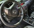 Серый Мазда 3, объемом двигателя 1.6 л и пробегом 220 тыс. км за 5800 $, фото 18 на Automoto.ua