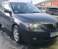 Серый Мазда 3, объемом двигателя 1.6 л и пробегом 202 тыс. км за 5200 $, фото 1 на Automoto.ua