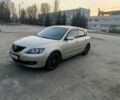 Сірий Мазда 3, об'ємом двигуна 2 л та пробігом 260 тис. км за 4200 $, фото 1 на Automoto.ua
