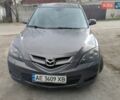 Серый Мазда 3, объемом двигателя 2 л и пробегом 258 тыс. км за 5500 $, фото 1 на Automoto.ua