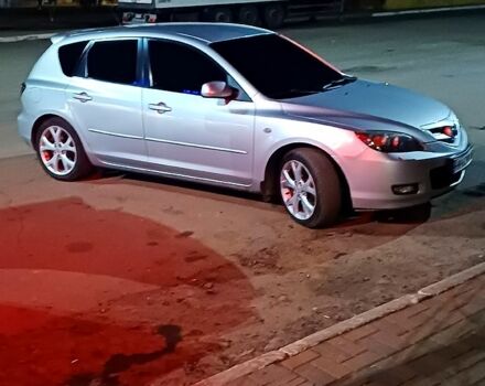 Серый Мазда 3, объемом двигателя 2 л и пробегом 230 тыс. км за 6000 $, фото 2 на Automoto.ua