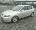 Серый Мазда 3, объемом двигателя 2 л и пробегом 250 тыс. км за 4600 $, фото 1 на Automoto.ua