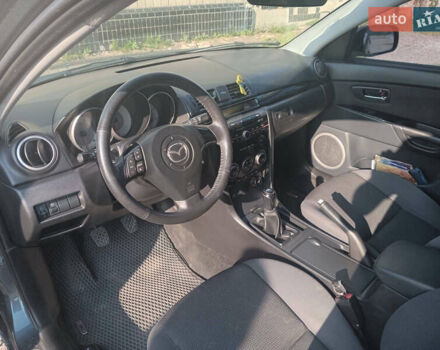 Серый Мазда 3, объемом двигателя 1.6 л и пробегом 215 тыс. км за 5650 $, фото 7 на Automoto.ua