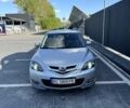 Серый Мазда 3, объемом двигателя 1.56 л и пробегом 249 тыс. км за 4500 $, фото 1 на Automoto.ua