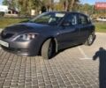 Серый Мазда 3, объемом двигателя 1.4 л и пробегом 273 тыс. км за 4700 $, фото 1 на Automoto.ua