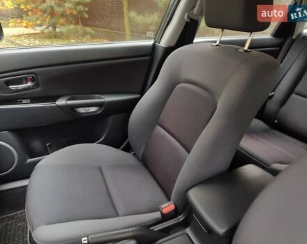 Серый Мазда 3, объемом двигателя 1.6 л и пробегом 191 тыс. км за 5500 $, фото 18 на Automoto.ua