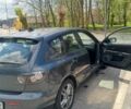 Серый Мазда 3, объемом двигателя 1.56 л и пробегом 206 тыс. км за 5200 $, фото 1 на Automoto.ua