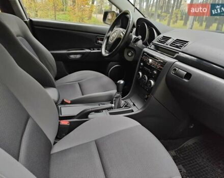 Серый Мазда 3, объемом двигателя 1.6 л и пробегом 191 тыс. км за 5500 $, фото 30 на Automoto.ua