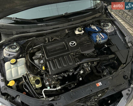 Серый Мазда 3, объемом двигателя 1.6 л и пробегом 66 тыс. км за 6999 $, фото 14 на Automoto.ua