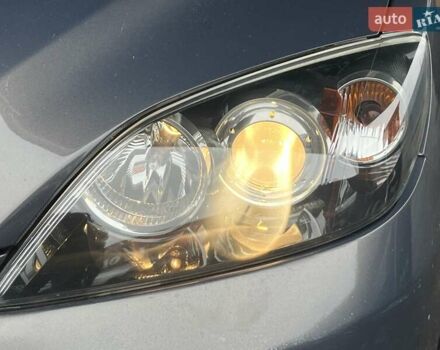 Сірий Мазда 3, об'ємом двигуна 1.6 л та пробігом 195 тис. км за 5699 $, фото 4 на Automoto.ua