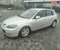 Серый Мазда 3, объемом двигателя 2 л и пробегом 250 тыс. км за 4600 $, фото 1 на Automoto.ua
