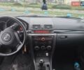 Серый Мазда 3, объемом двигателя 2 л и пробегом 250 тыс. км за 4600 $, фото 7 на Automoto.ua