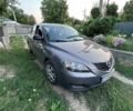 Сірий Мазда 3, об'ємом двигуна 1.3 л та пробігом 234 тис. км за 4117 $, фото 1 на Automoto.ua