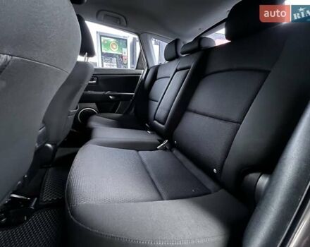 Сірий Мазда 3, об'ємом двигуна 1.6 л та пробігом 195 тис. км за 5699 $, фото 14 на Automoto.ua