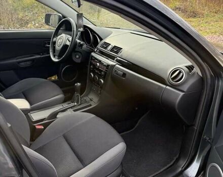 Серый Мазда 3, объемом двигателя 1.6 л и пробегом 235 тыс. км за 6200 $, фото 7 на Automoto.ua